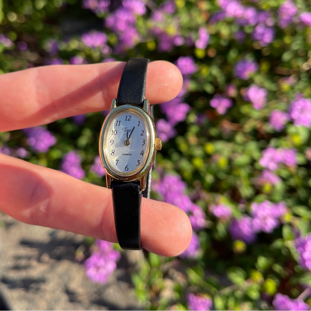 Elegant Black and Gold Timex Watch